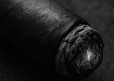 Close-up of cigar ember glowing in Cleveland cigar bar
