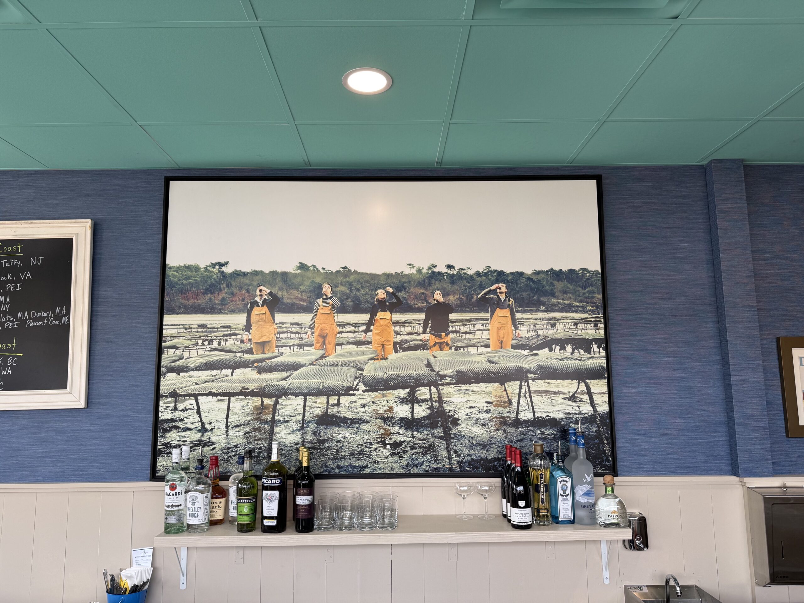 The blue and sea-green interior bar at EDWINS Oyster Bar